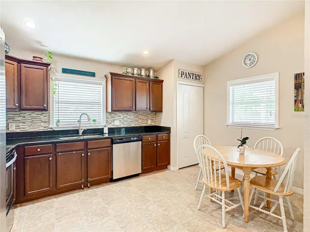 Kitchen has eat in space for dinette.