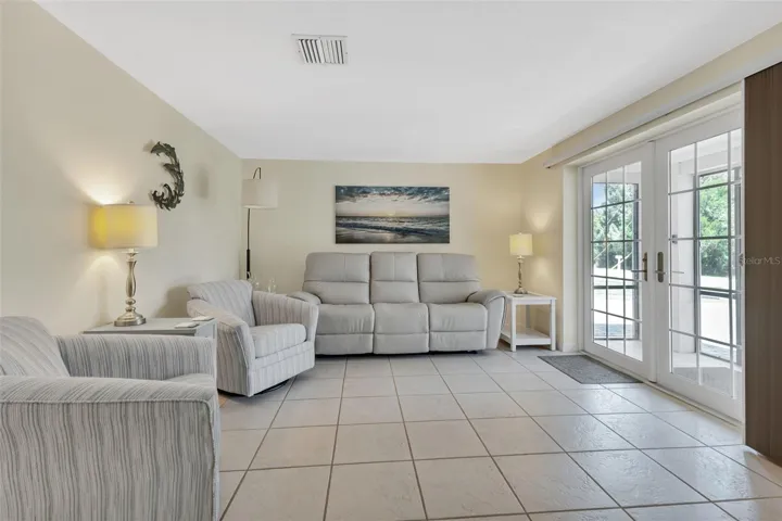 Living room with tile flooring