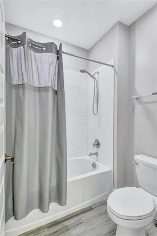 Shower in tub in Jack and Jill bathroom