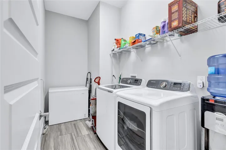 Laundry room next to the kitchen