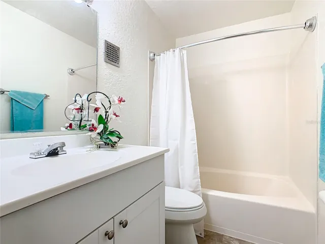 Bathroom has tub shower combination