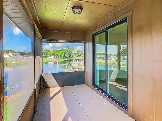 Screened porch overlooks the lake