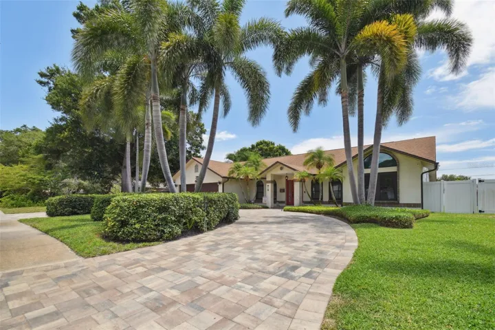 Mature landscaping and and well cared for lawn.