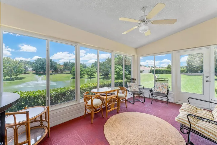 Enclosed lanai with a spectacular view of the pond