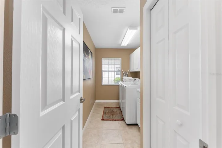 Inside Laundry Room with washer and dryer