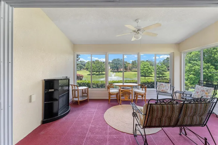 Enclosed lanai with a spectacular view of the pond
