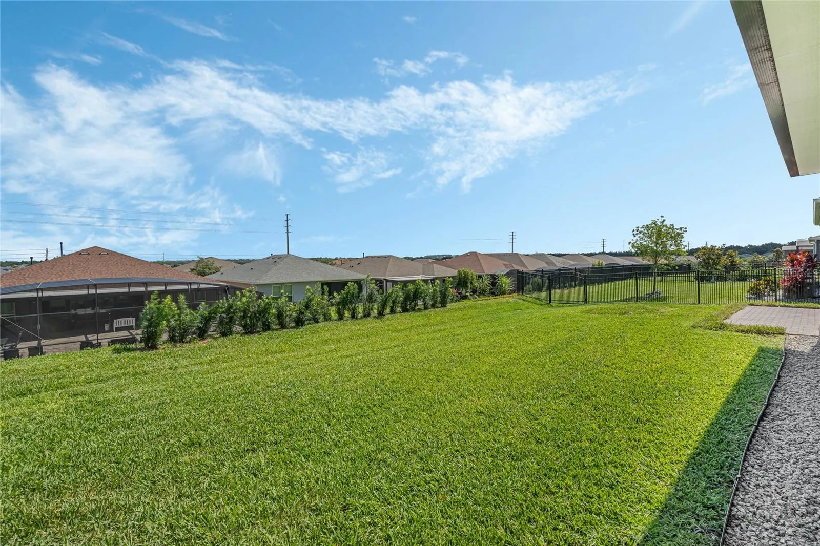 BEAUTIFUL LOT W/NEWLY PLANTED PORTOCOPUS HEDGE FOR A PRIVACY