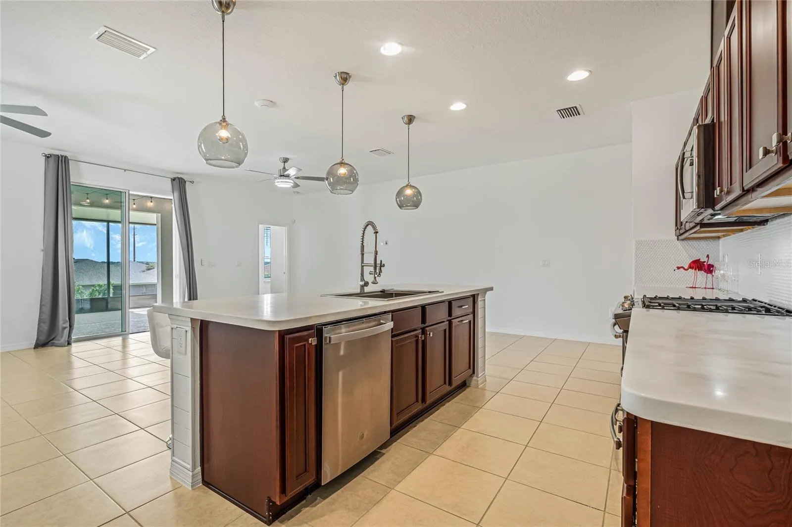 WELL APPOINTED KITCHEN IS THE CENTER OF THIS HOME