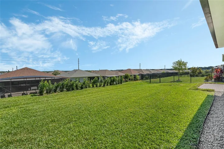 BEAUTIFUL LOT W/NEWLY PLANTED PORTOCOPUS HEDGE FOR A PRIVACY