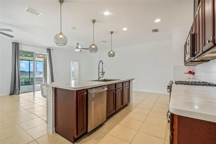 WELL APPOINTED KITCHEN IS THE CENTER OF THIS HOME