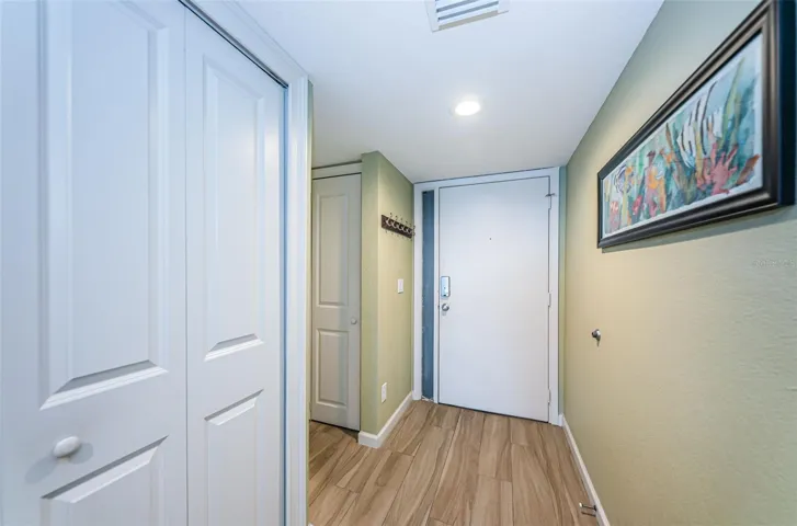 .. Kitchen Pantry on Left ( 4 Panel White Door ).. 3rd Bedroom thru Left Hallway by Single 2 Panel Door.... Entrance / Exit  Door to Unit is Plain 32