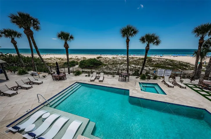 Perfect shot of the Pool from  the 3rd Stack... Enjoy the Night Shots at end of Photos...NOTE : The Beach House is a Small Private 12 Unit Complex .. Pool is never Crowded or overused. Just the opposite..