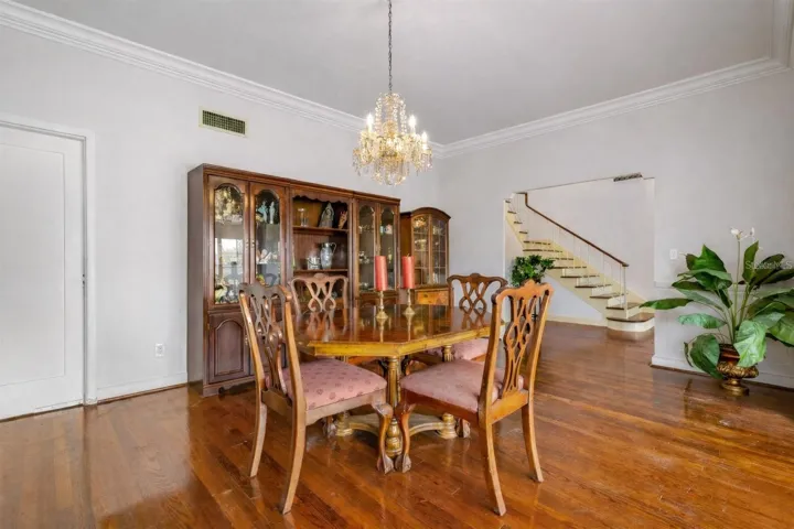 Dining Room with wallpaper removed.