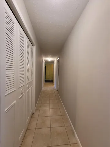 Hallway towards foyer Storage closet