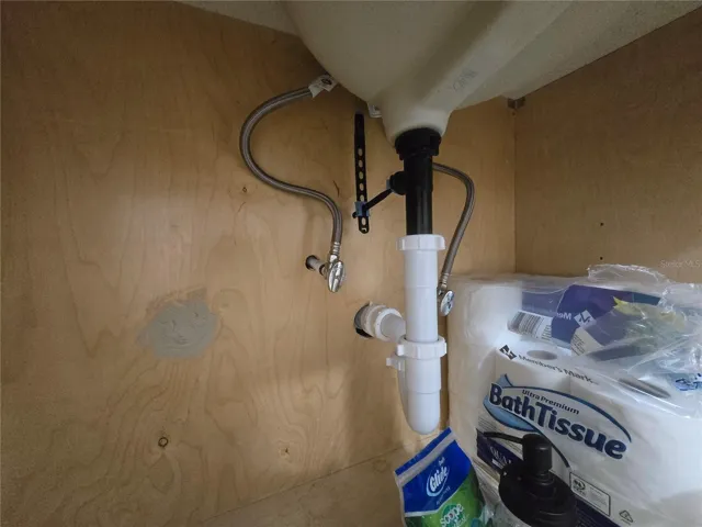 Under guest/hall bathroom sink