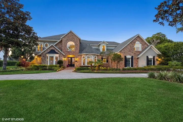 Front with semi-gated circular driveway