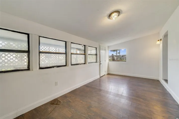 ONE OF TWO LIVING AREAS.