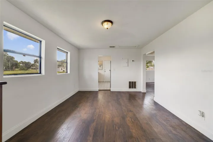 ONE OF TWO LIVING AREAS.