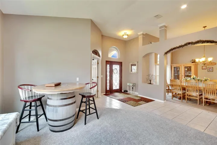 Foyer opens into the dining room and living room
