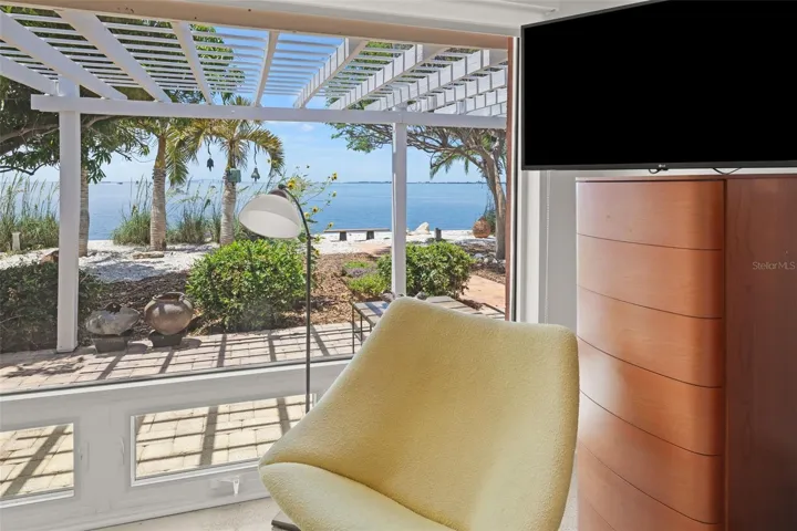 Unwind with spectacular views of Tampa Bay from entrance, living area, kitchen, primary bedroom, and more!