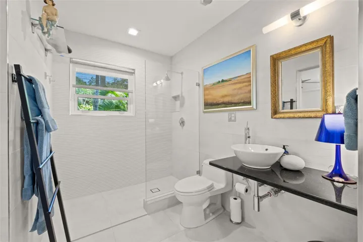 All bathrooms have been remodeled and two of them showcase expose pipes.
