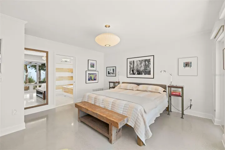 Spacious Primary bedroom with a walk in closet and en suite bathroom.
