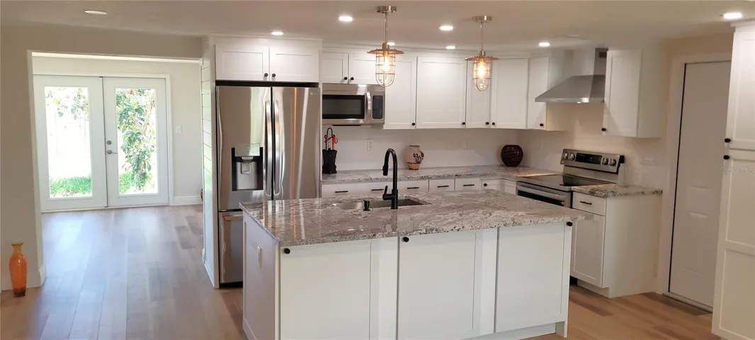 All New Kitchen with Center Island with Water and Power Granite Counter Tops