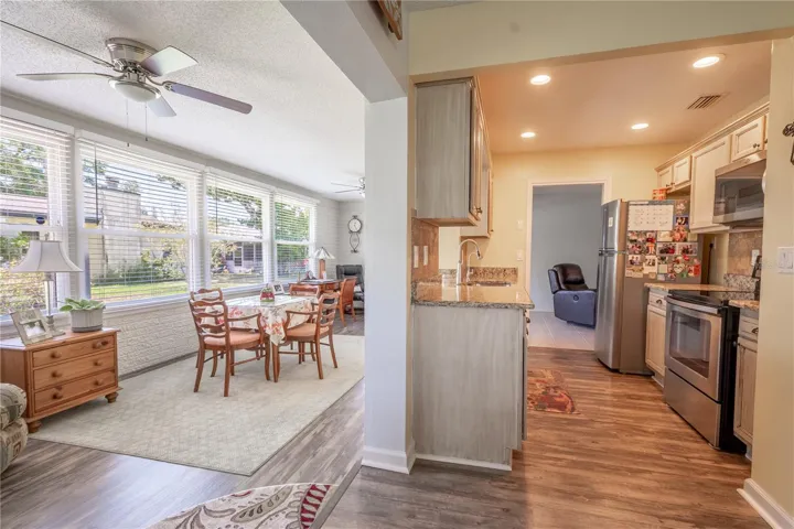The kitchen is open to the Four-Seasons Florida Room.