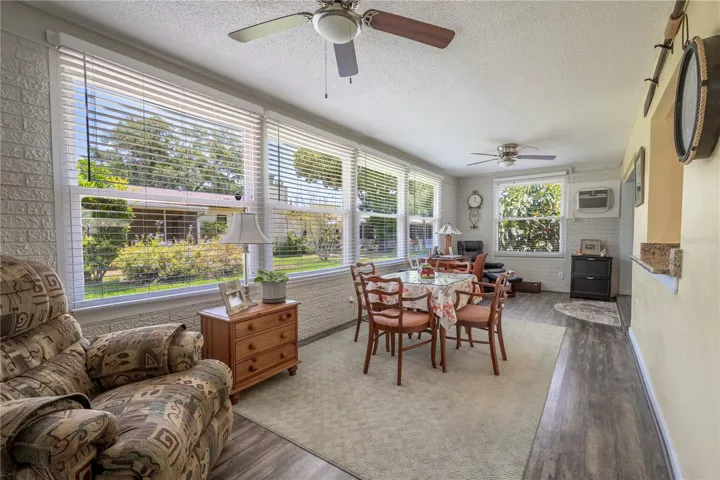 The Florida Room is flooded with natural light.
