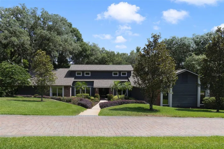 Front View with Beautifully Landscaped and Maintained Lot