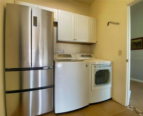 Laundry Room with Cabs for Storage