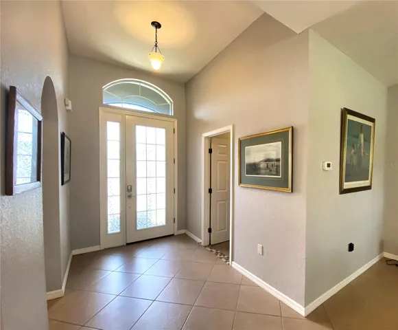 Front Door with Eyebrow window and side lights