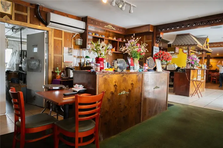 Left to right:  Main Kitchen Entrance, Private Room Hostess Area and Main Entrance