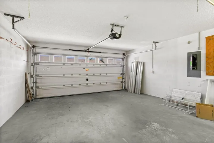 2 Car Garage complete with sink and room for a golf cart!