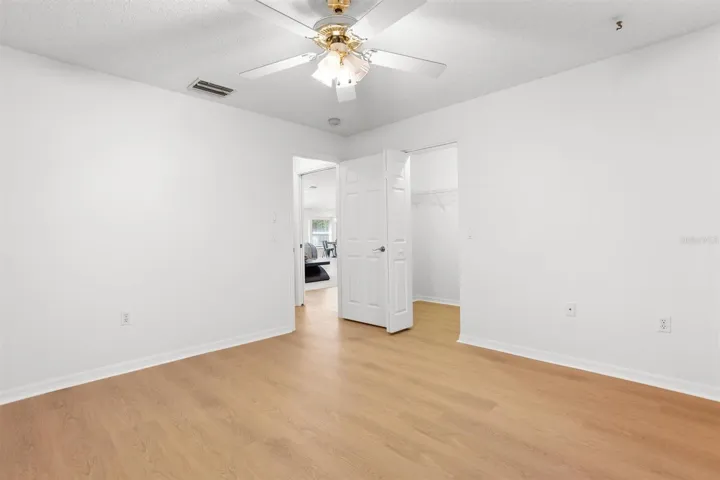 View with additional walk in closet in the foreground