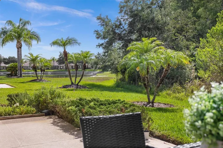 Private, Rear Patio Looking At Pond - Birdcage could be added with HOA approval!