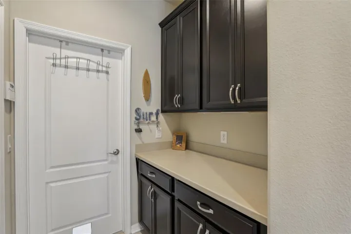 Mudroom/Garage entry with additional storage and separate door to laundry room