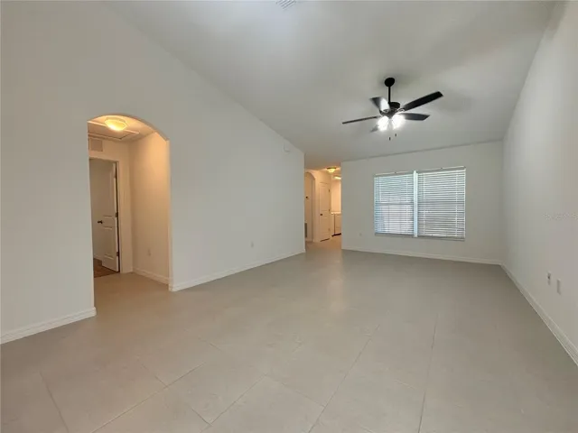Bright and open living and dining room has loads of natural light.
