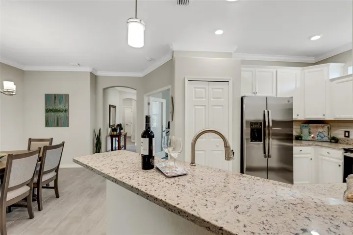 Granite and Tile Backsplash Upgraded Lighting