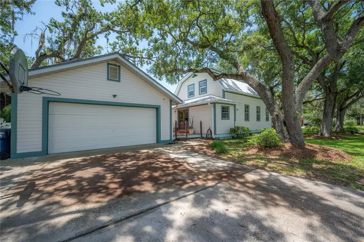 Detached side entry garage.