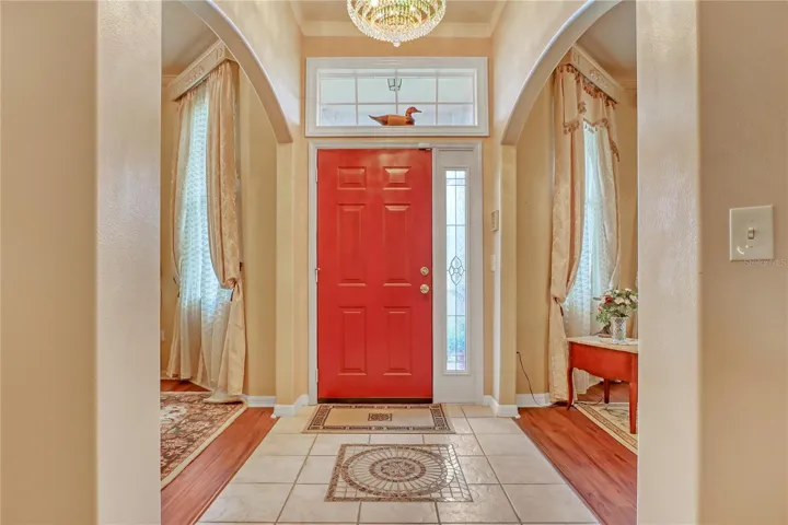 Foyer with formal living room and dinning room to each side.