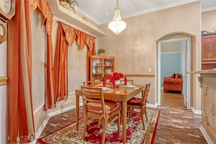 Kitchen nook - floors are linolium over tile.  The linolium can be easily removed to show light color tile.