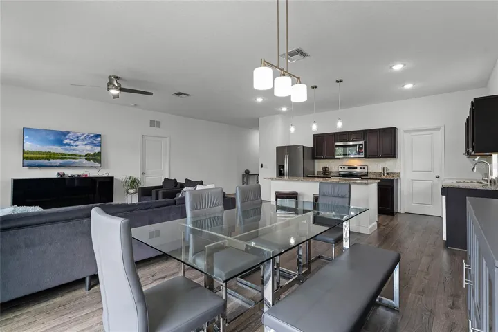 Dining & kitchen view from next to sliding glass door