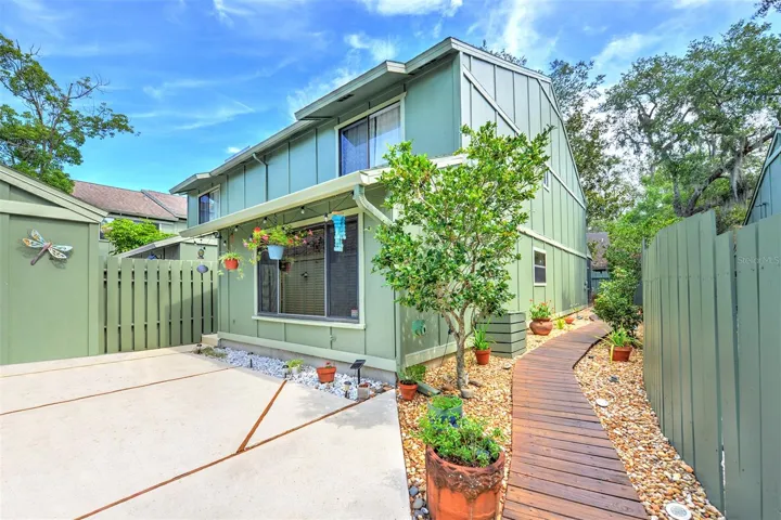 This lovely townhome is located in the "Timbers Edge" subdivision of the Trails. Courtyard setting makes this home inviting.