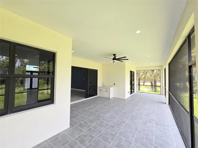 Screened Patio w Summer Kitchenette