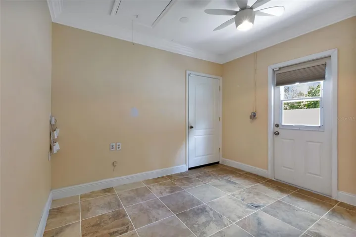 Bonus room has access to garage and side door to go outside.