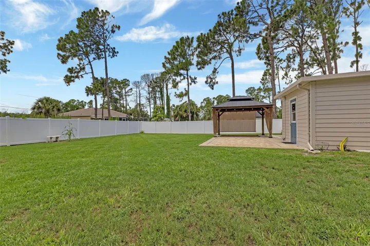 Fenced in backyard for extra privacy.