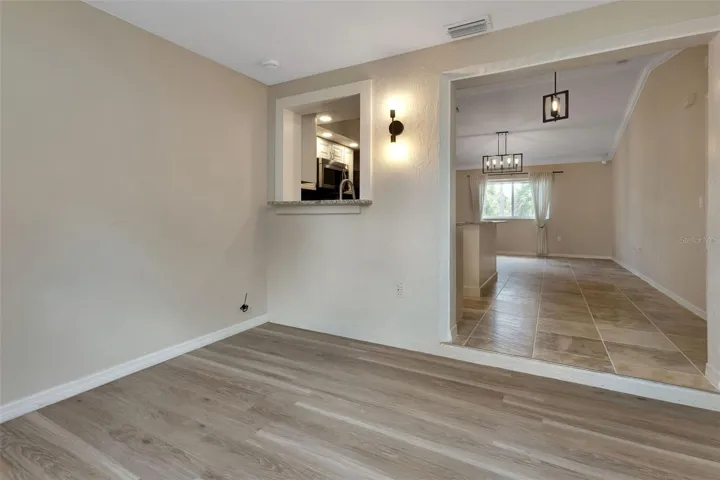 Florida room with laminate flooring.