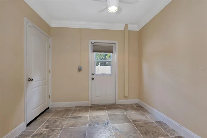 Bonus room part of converted garage. Could be used for office or den.