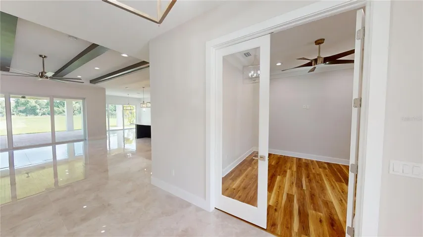 Den double glass doors and great room